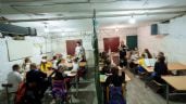 Foto ilustrativa de la nota titulada: Niños de Ucrania inician el año escolar en aulas subterráneas para evitar las bombas rusas